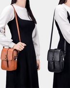 Bolsa Bia compacta transversal em couro