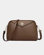 Bolsa de couro solta com alça fina