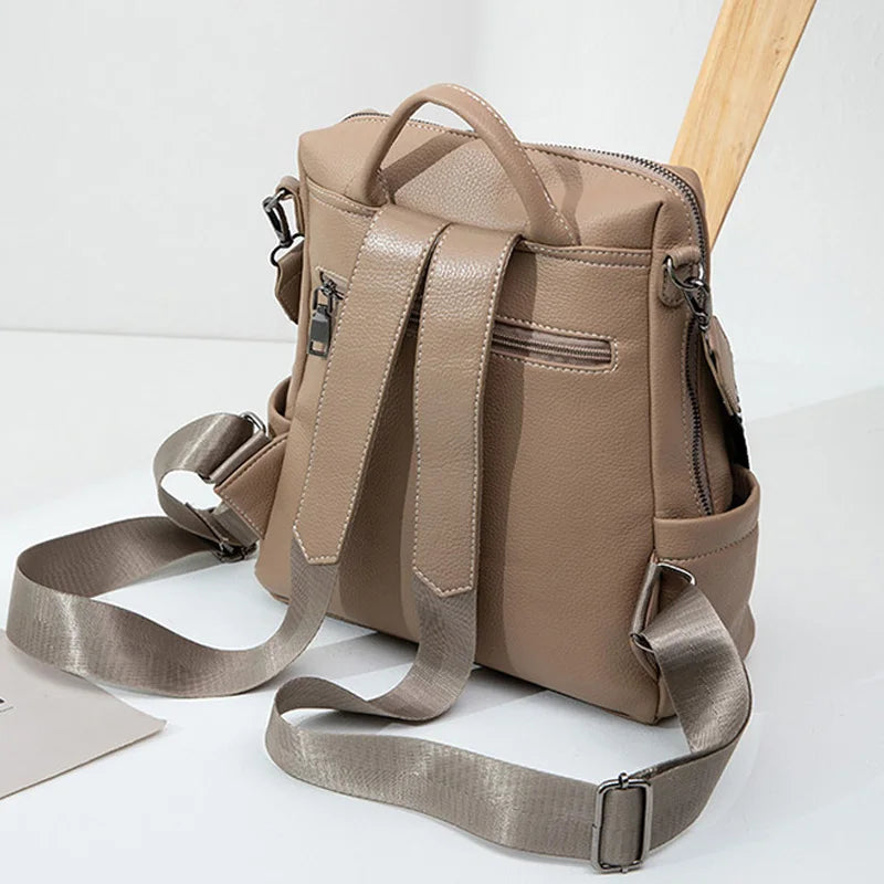 Mochila de costa e couro com alça dupla