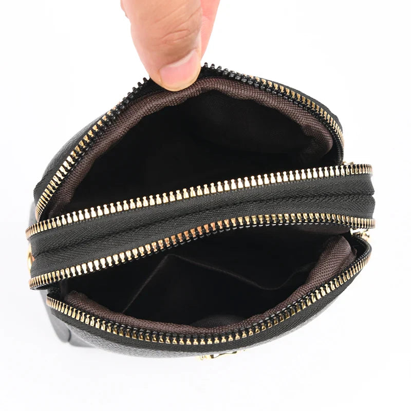 Bolsa compacta de couro Lucy