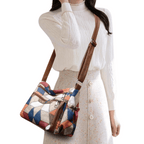 Bolsa transversal com estampa geométric